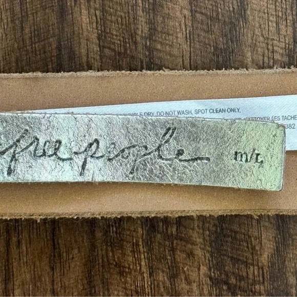 Free people metallic studded belt size M/L(34”-39”)